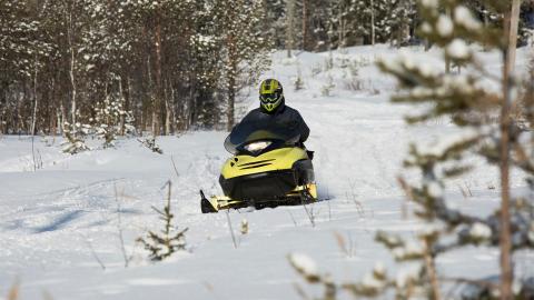 A person on a snowmobile
